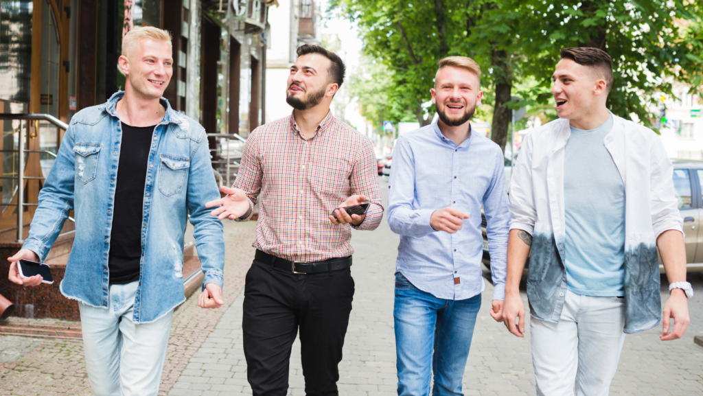group of young adults walking together representing first-time homebuyer age trends