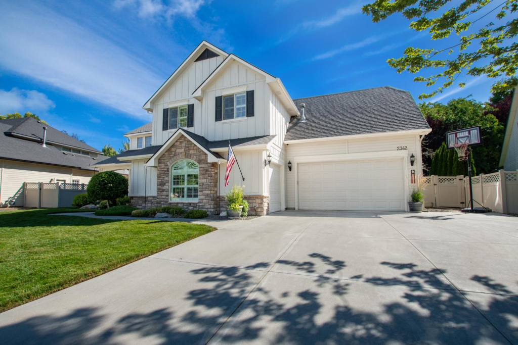 Front exterior of an established Treasure Valley home with mature landscaping